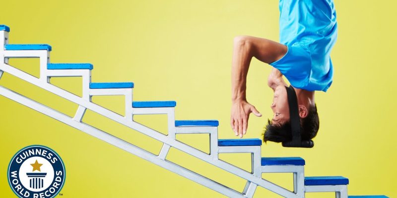 He climbs stairs with his HEAD! – Guinness World Records
