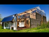 Greenhouse-wrapped Rotterdam home regulates climate & grows food